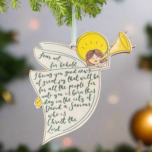 an angel christmas decoration speaking words from the gospel 