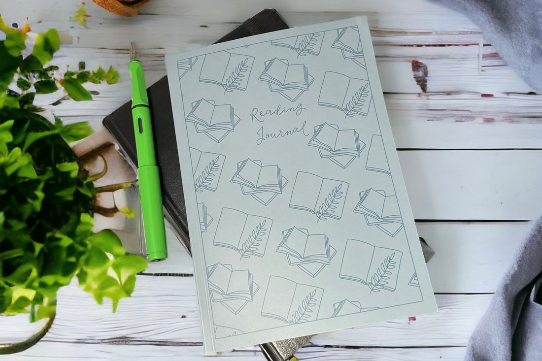 And Hope Designs Reading Journal on white tabletop with green fountain pen 