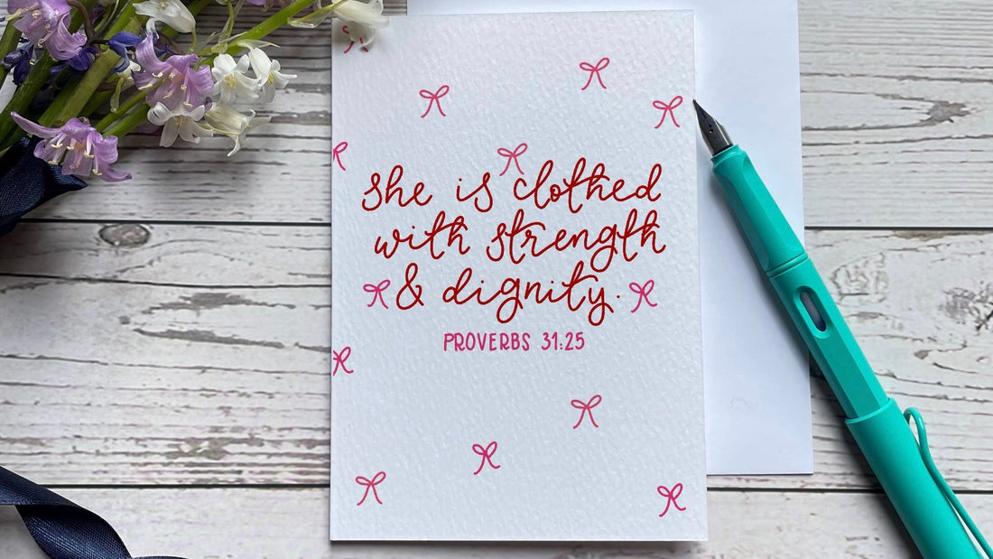 A Christian Mother’s Day card which says “she is clothed with strength and dignity” from proverbs 31