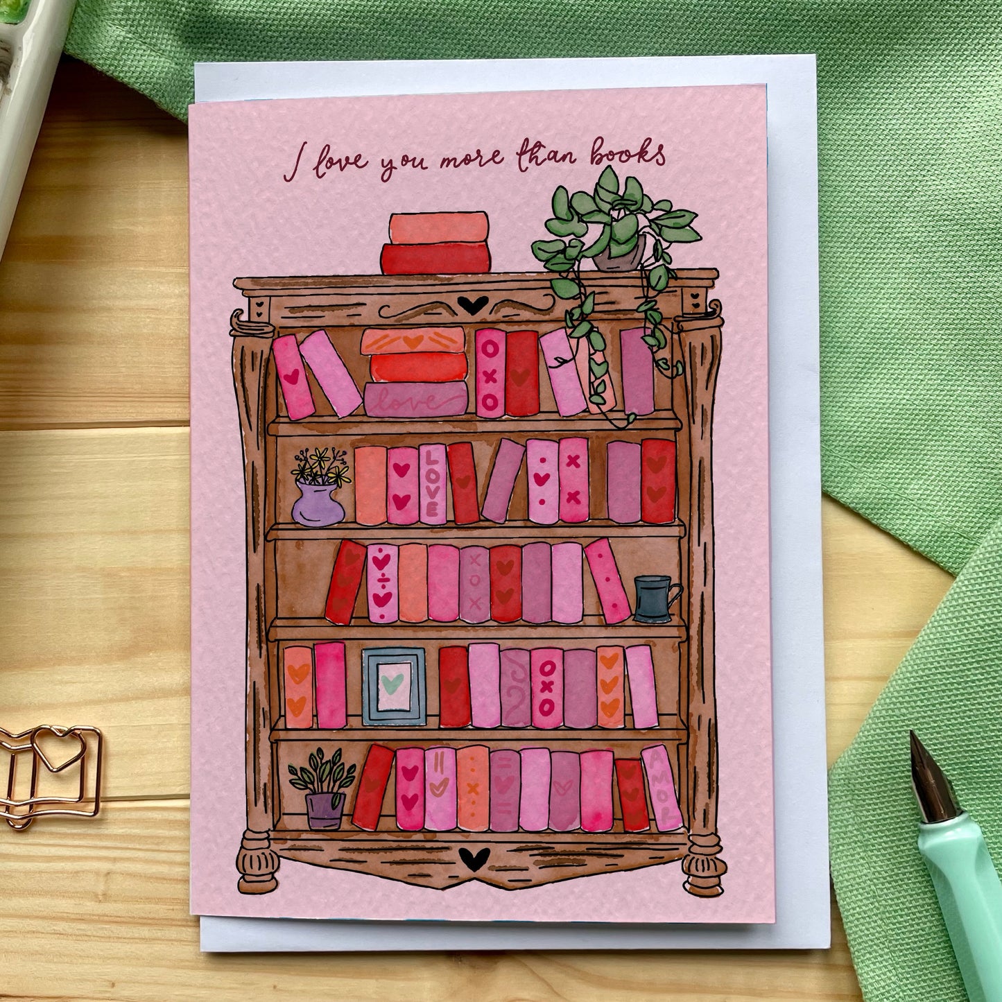 I love you more than books card - pink bookshelf