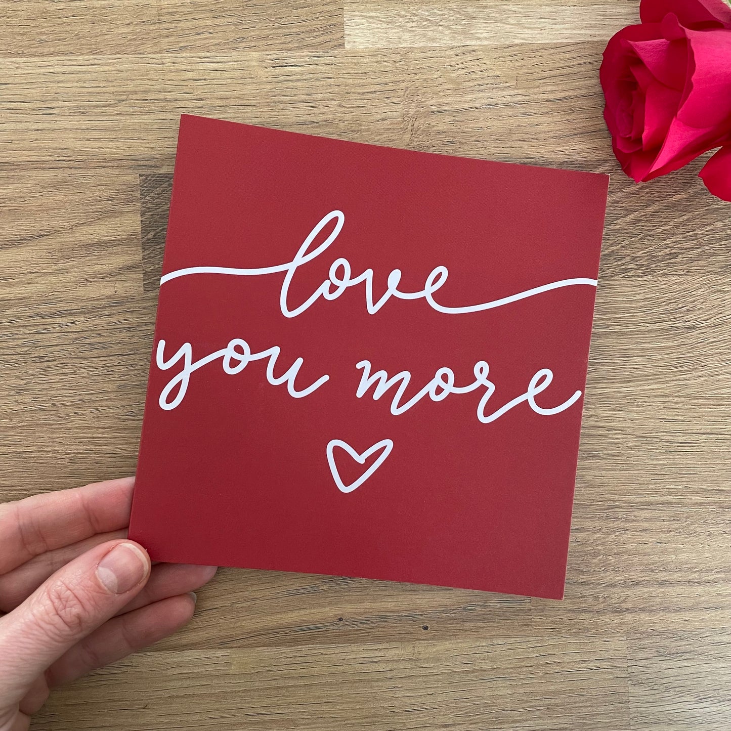 Love you more romantic greeting card