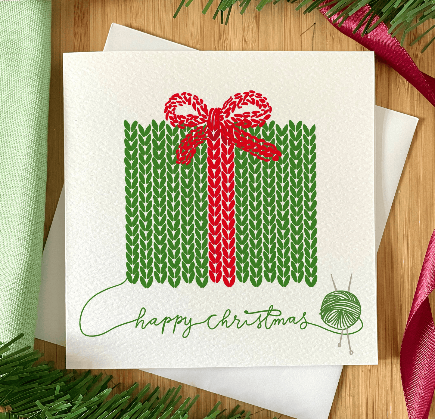 Knitter’s Christmas Card: Green & Red Wrapped Present And Hope Designs