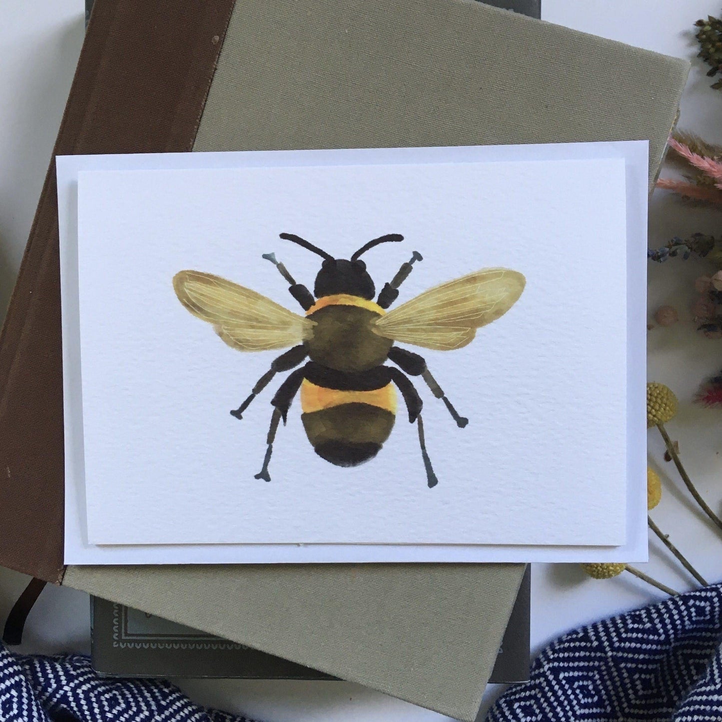 A6 greeting card with a watercolour bee painting. 