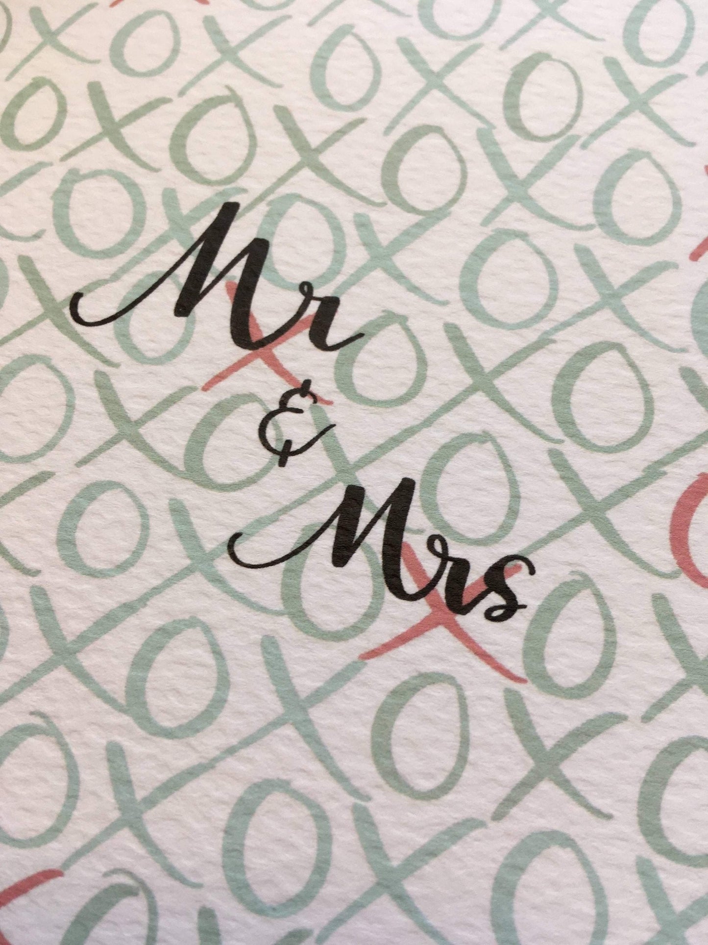 Close up of black hand lettered mr & mrs
