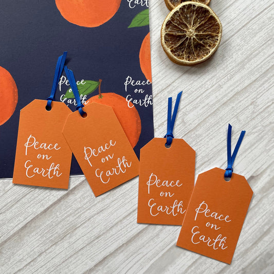 Orange peace on Earth gift tags Gift Tags And Hope Designs    - And Hope Designs