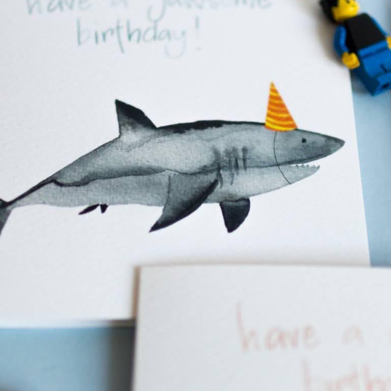 Close up of painted shark on textured birthday card